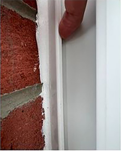 Incorrectly fitted doorframe beading